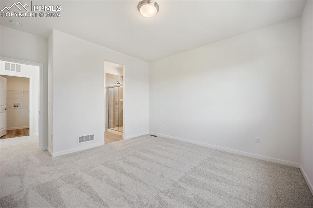 Image 18 of 29: Master Bedroom