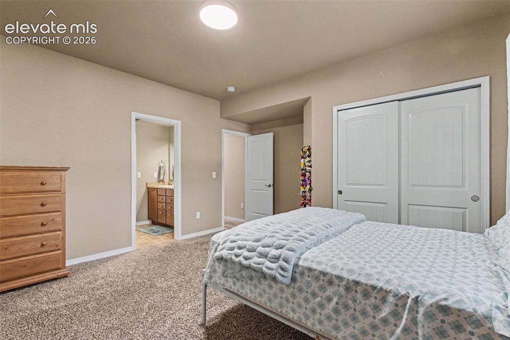 Image 32 of 47: Basement Bedroom