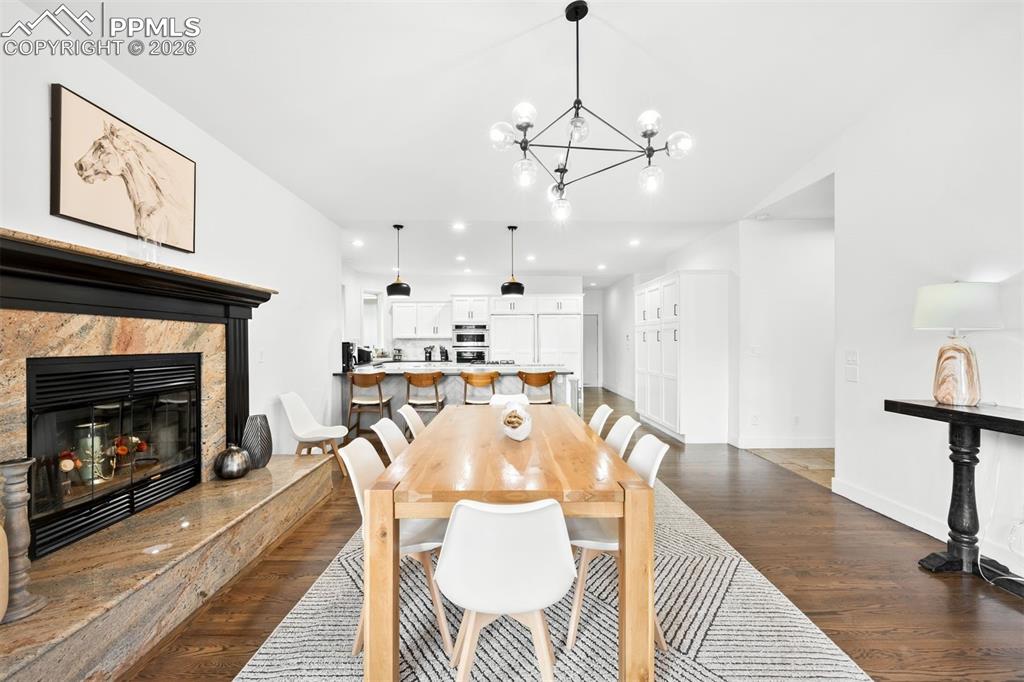 Image 11 of 45: Dining Room with Fireplace