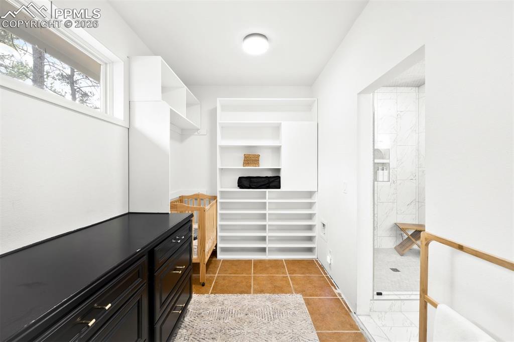 Image 16 of 45: Master Closet