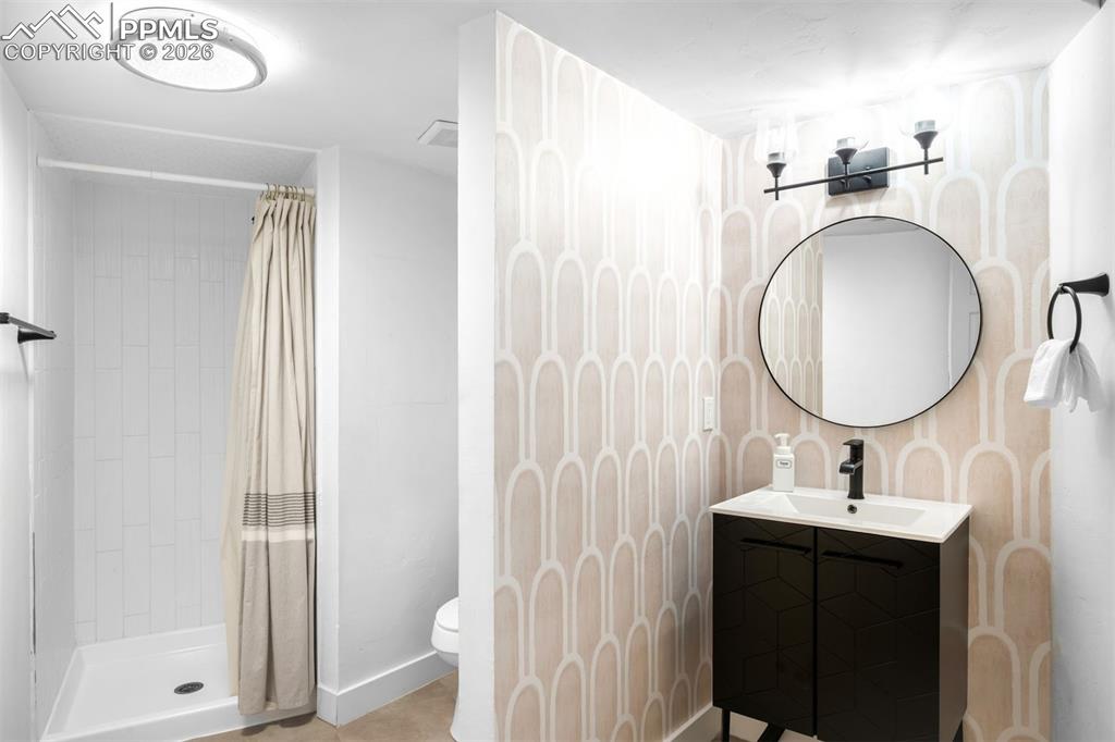 Image 30 of 45: Basement Bedroom