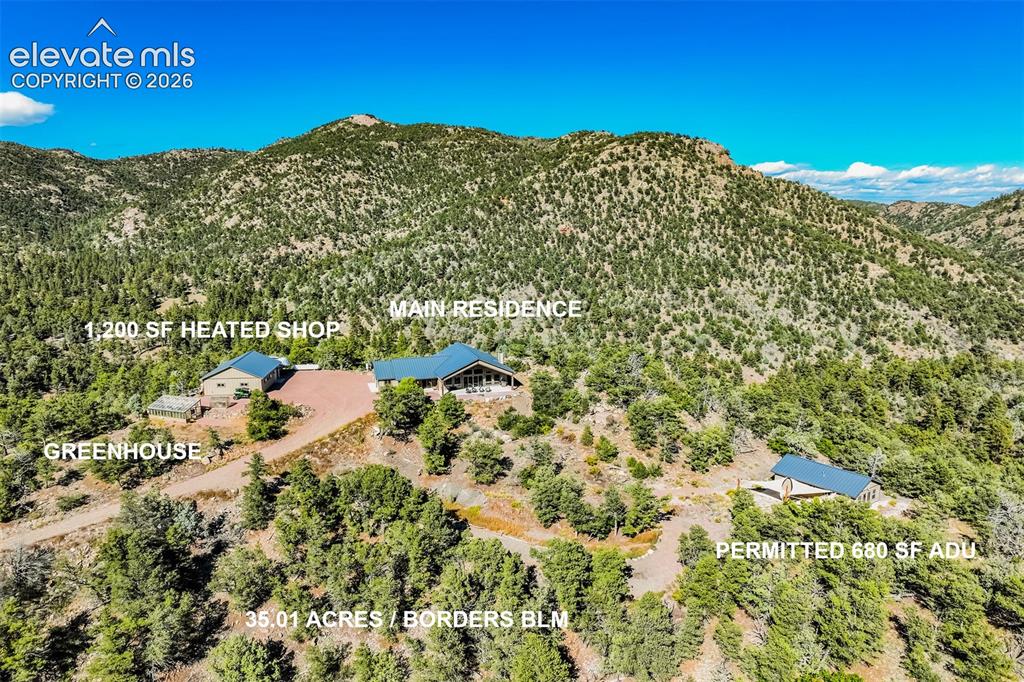 Image 2 of 50: 35-acre mountain compound: main residence + permitted 680 SF ADU + 1,200 SF