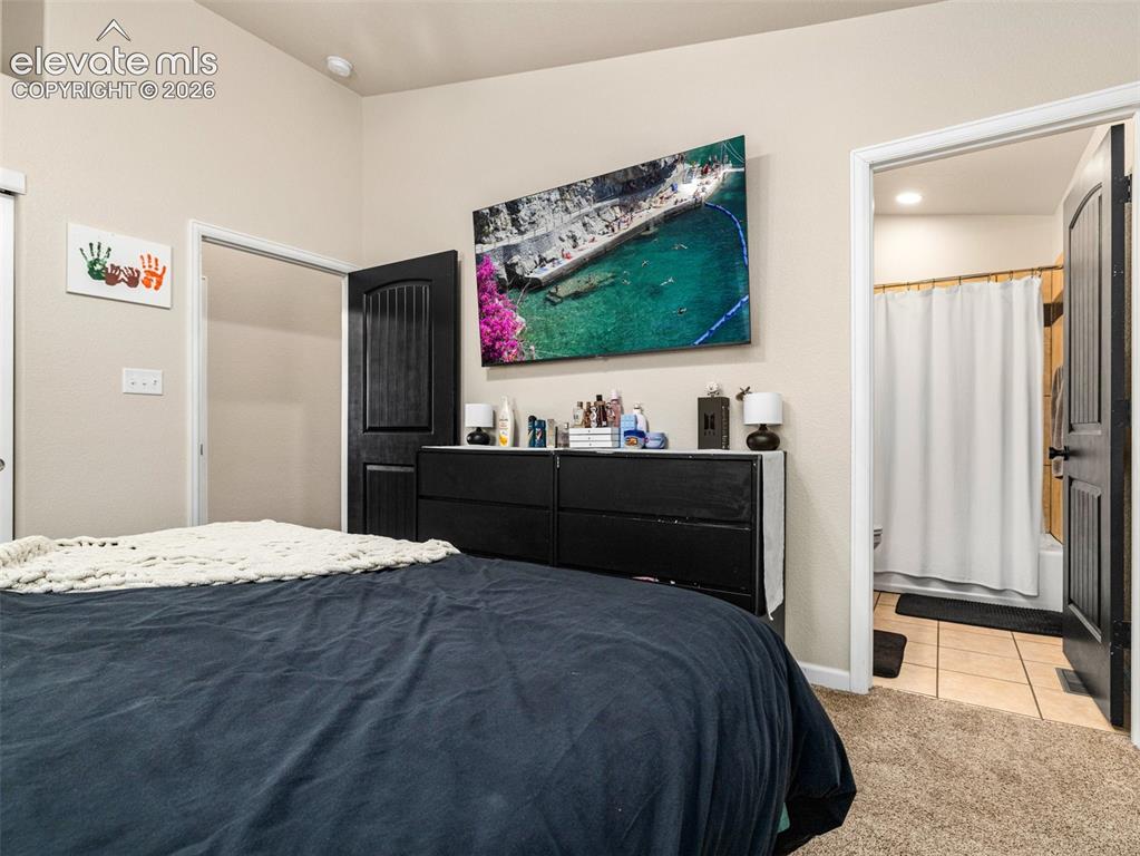 Image 12 of 19: Bedroom