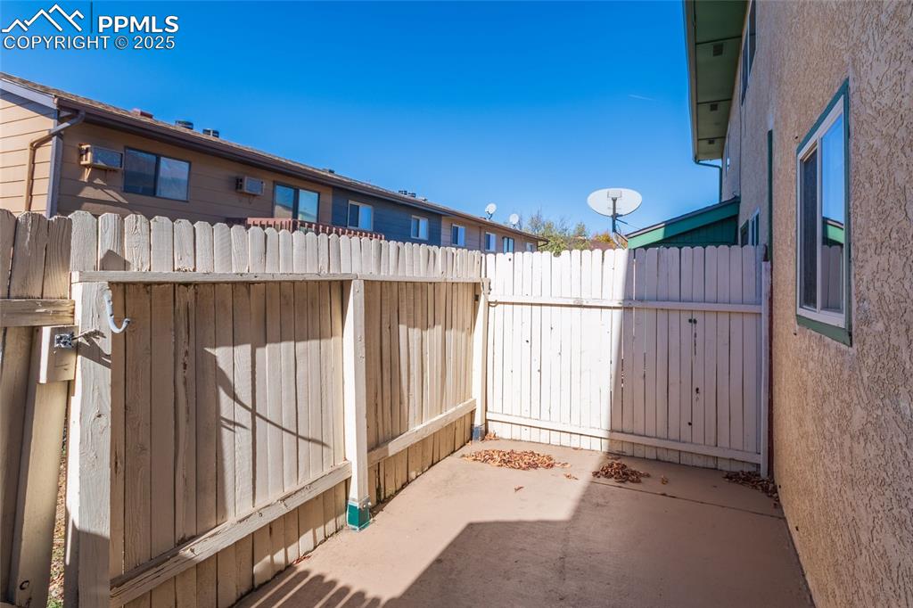 Image 6 of 35: View of patio / terrace with a gate