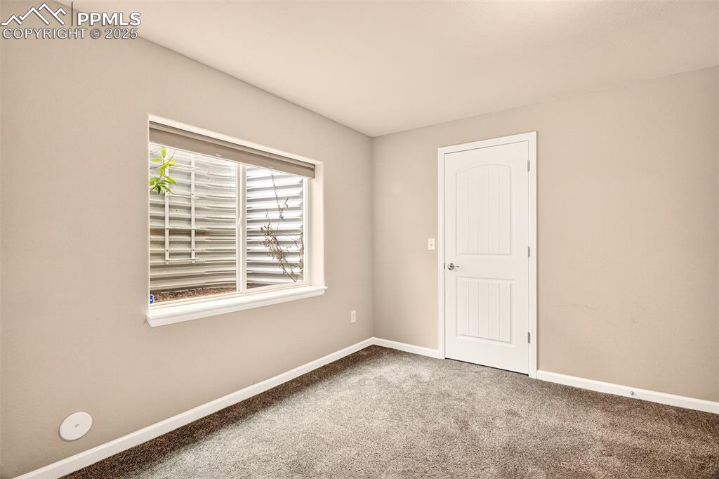 Image 30 of 37: This bedroom offers its own walk-in closet