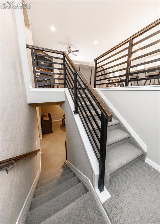 Image 23 of 37: Well-designed staircase leads to a full basement, offering additional space