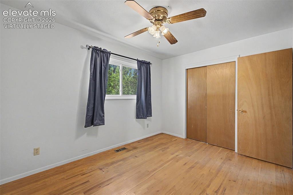 Image 26 of 50: Virtually Staged with flooring - wood flooring under carpet