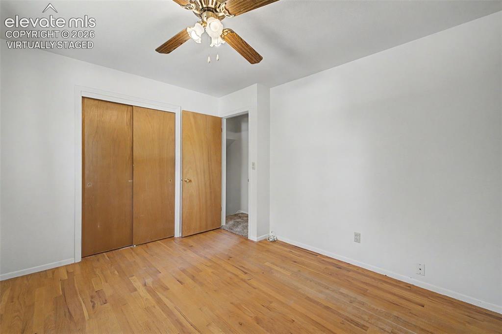 Image 27 of 50: Virtually Staged with flooring - wood flooring under carpet