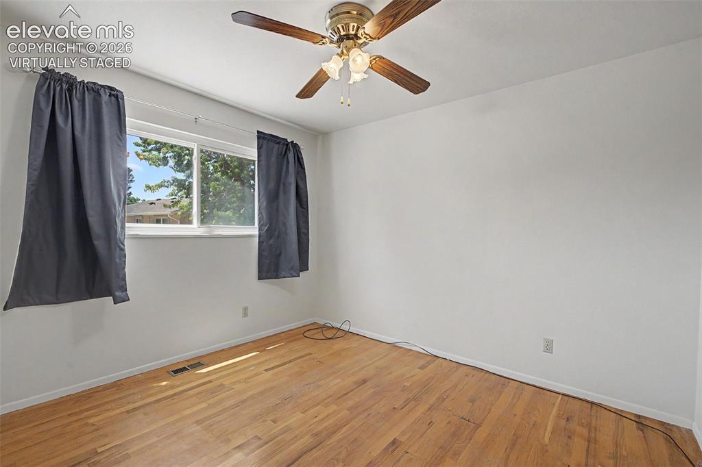Image 30 of 50: Virtually Staged with flooring - wood flooring under carpet