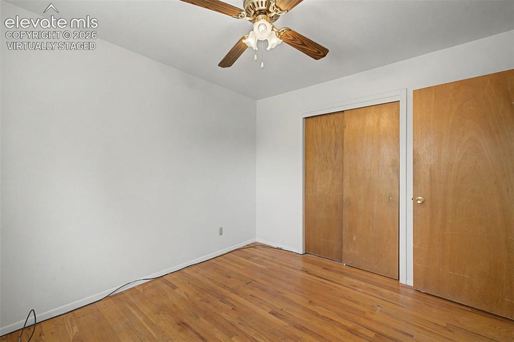 Image 32 of 50: Virtually Staged with flooring - wood flooring under carpet