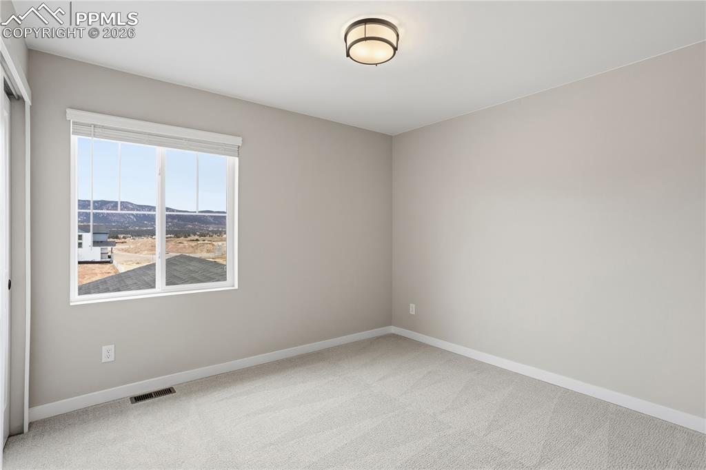 Image 14 of 33: Bedroom