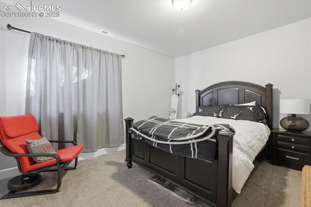 Image 24 of 31: Bedroom #2 in the basement.