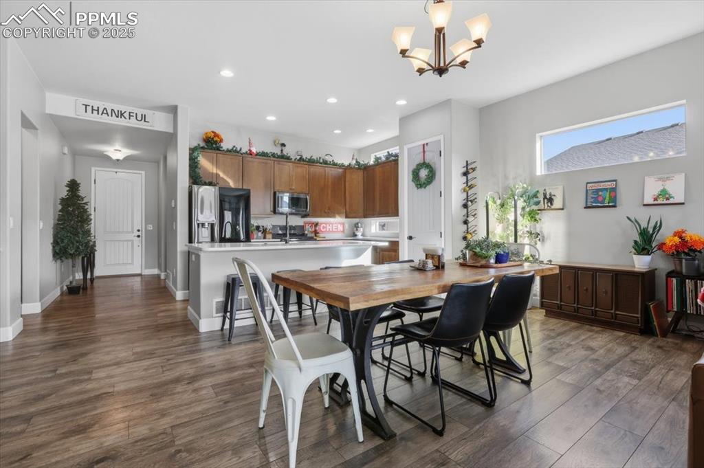 Image 3 of 31: Entry Way that leads into the Kitchen and Dining Room