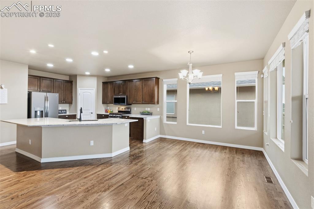 Image 10 of 43: Stainless Steel Appliances and gas range.