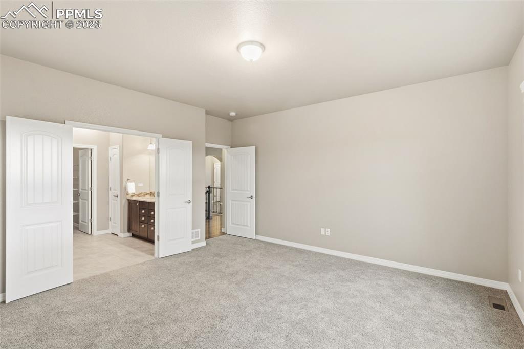 Image 18 of 43: Master Bedroom