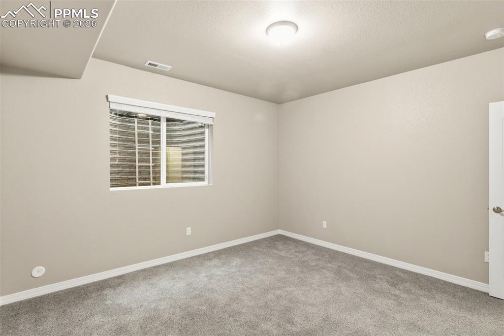Image 37 of 43: Walk-in closet