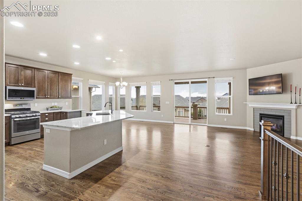 Image 9 of 43: Walkout to Covered Deck with Pikes Peak and Front Range views