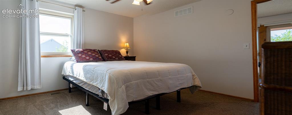 Image 22 of 38: Bedroom
