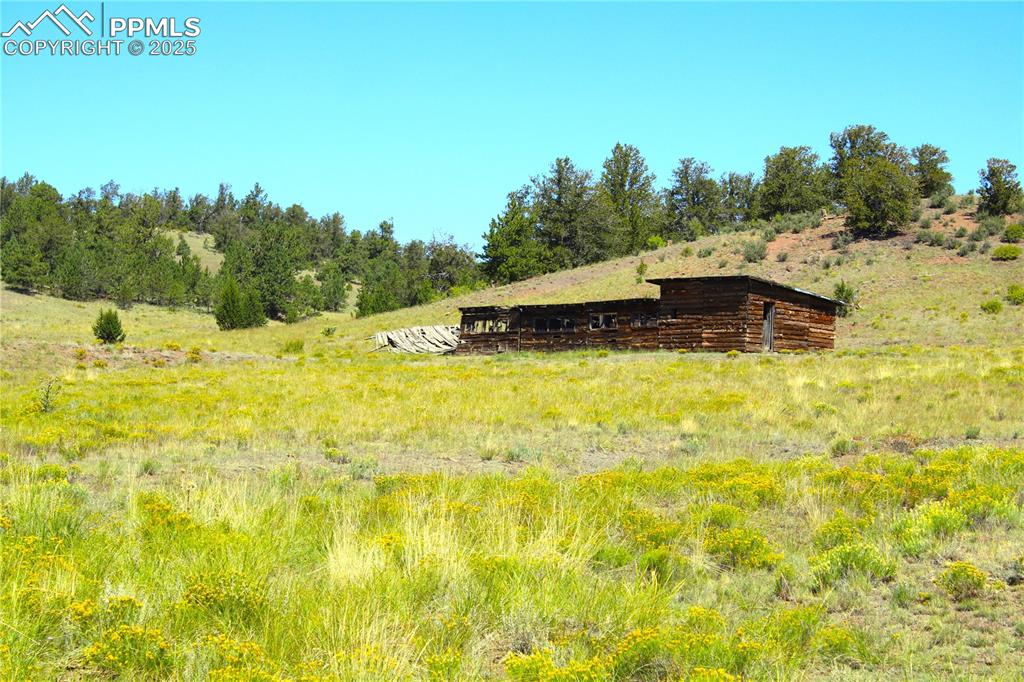 Image 14 of 18: View of yard featuring a view of rural / pastoral area