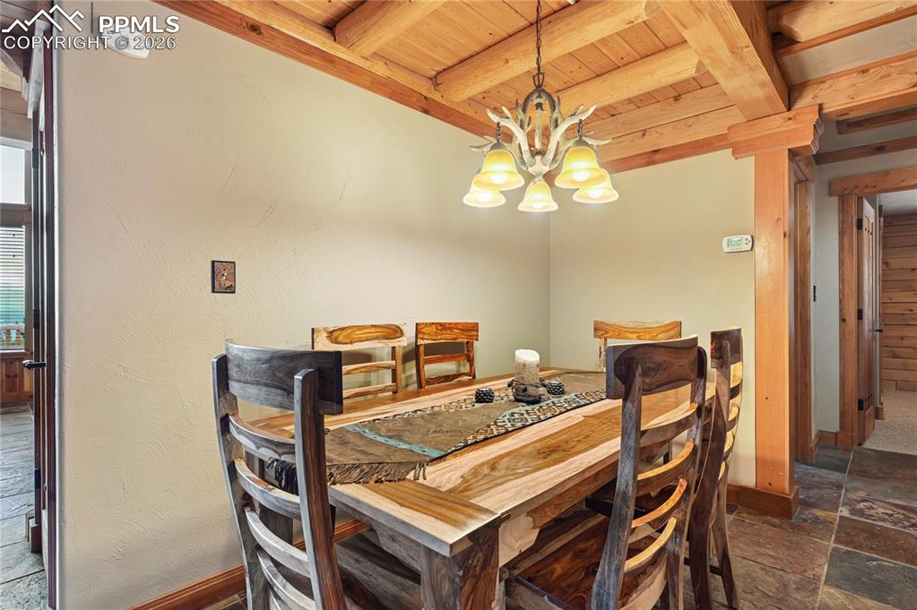 Image 17 of 43: The dining area off the kitchen could also be an office nook if you wanted