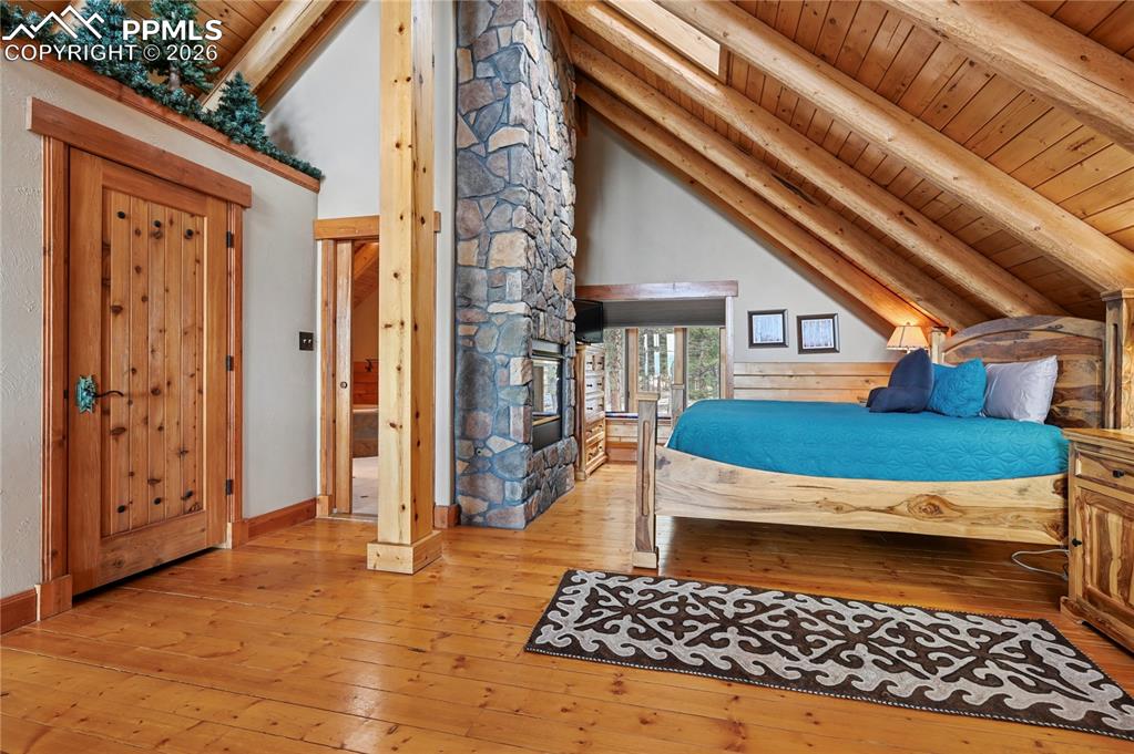 Image 23 of 43: The master suite encompasses the entire lofted second level of the home, an
