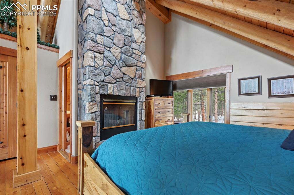 Image 24 of 43: The lofted master suite has something to look at on every side, with a 2-si