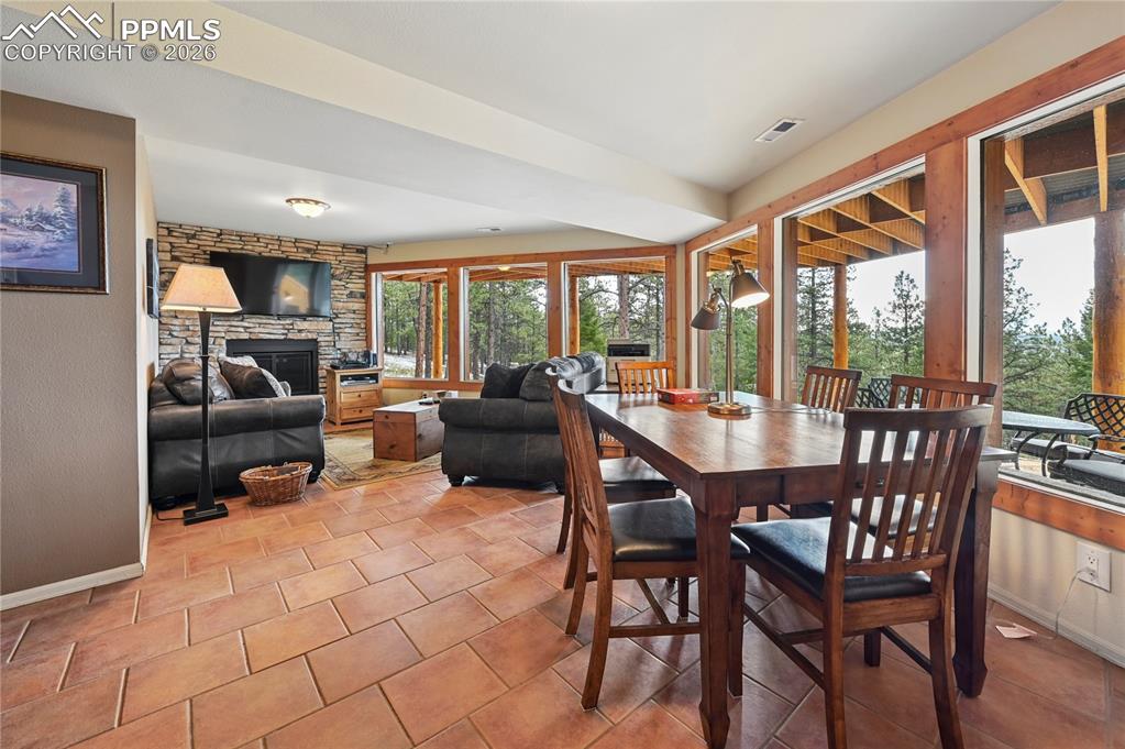 Image 30 of 43: The basement of the home hardly feels like it, because it has its own full