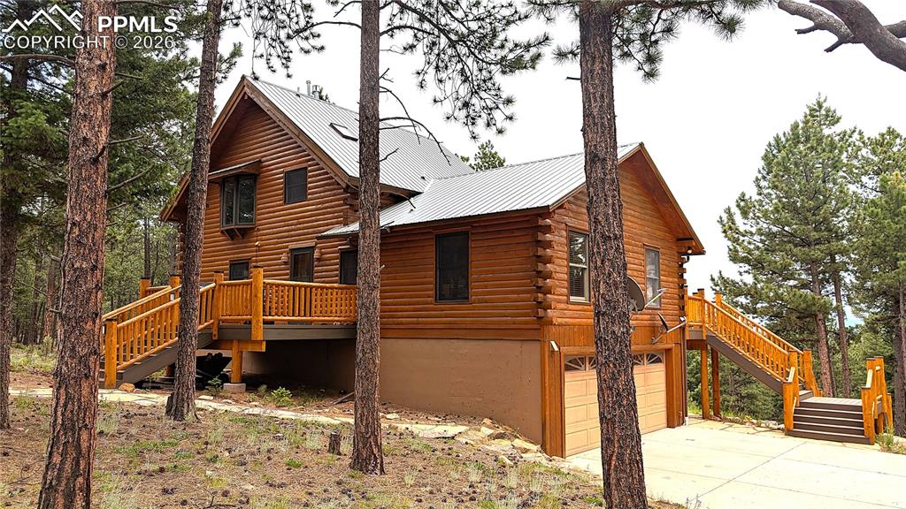 Image 4 of 43: This mountain get-away has a 2-car attached garage so you can pull out of t
