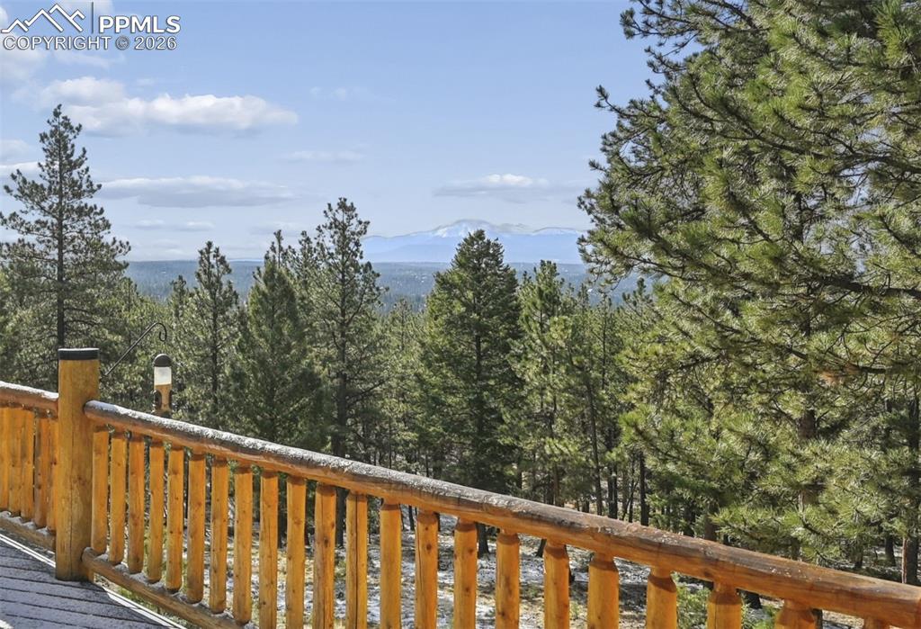 Image 8 of 43: The views from this home are breathtaking, and since the adjoining lot is i