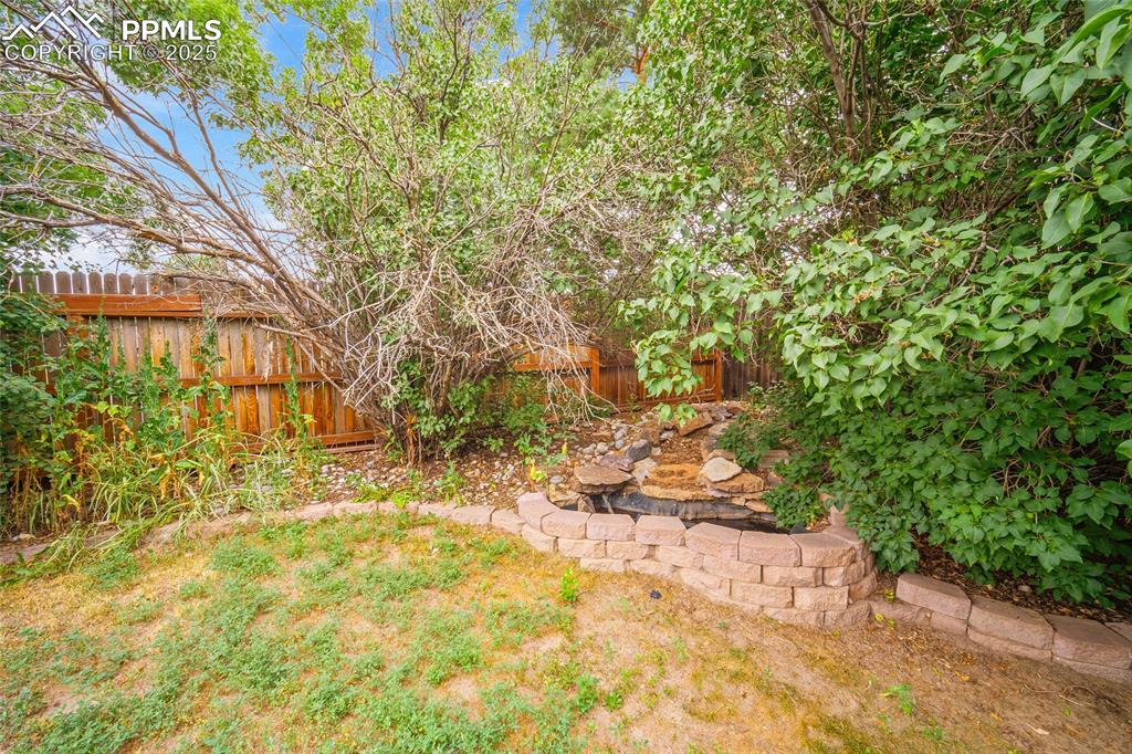 Image 43 of 50: backyard with small pond