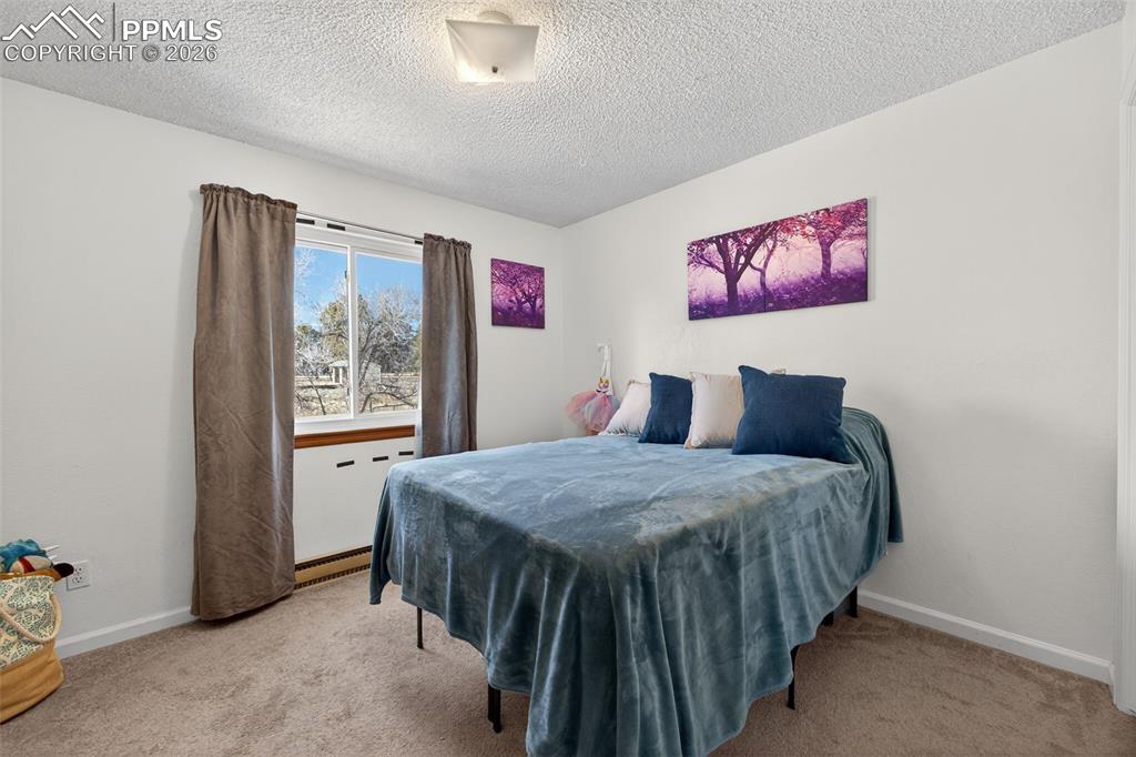 Image 14 of 34: Upper Secondary Bedroom