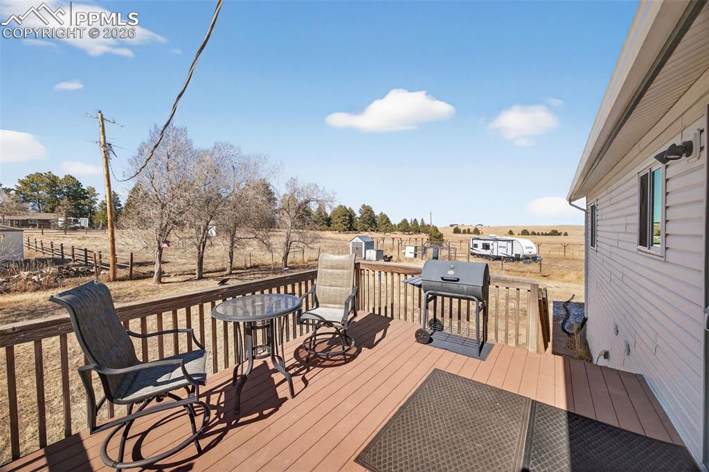 Image 21 of 34: Lovely Back Deck off Kitchen