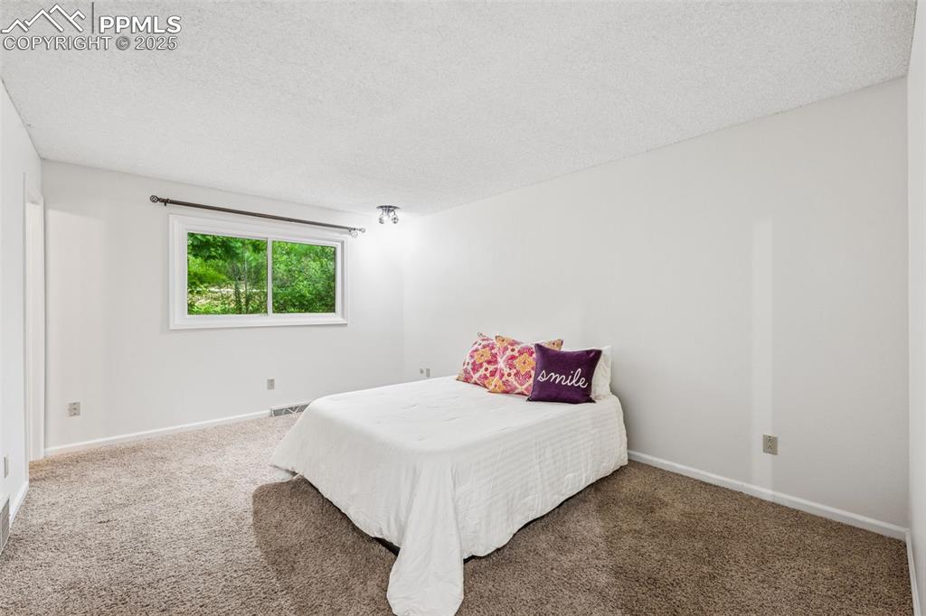 Image 18 of 42: Bedroom