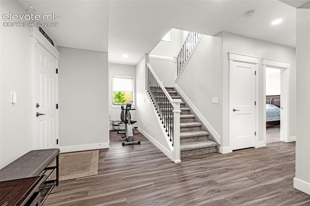 Image 11 of 33: Finished basement, living area, full bathroom and 1 bedroom.