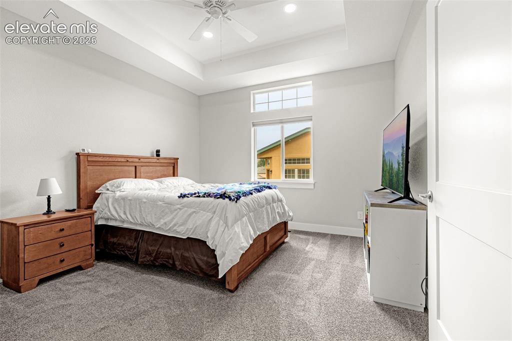 Image 22 of 33: 1 of 2 main level bedrooms