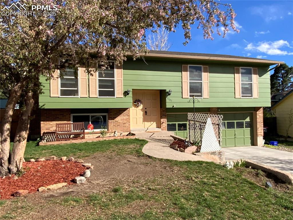Image 2 of 22: Front Elevation of Bi-Level Home