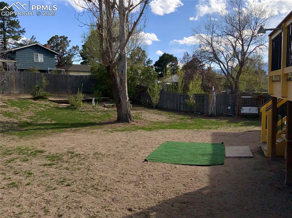 Image 22 of 22: View of Back Yard