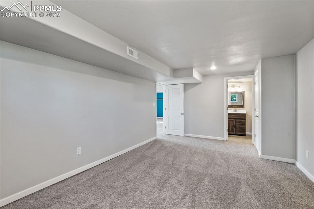 Image 33 of 50: basement bedroom 