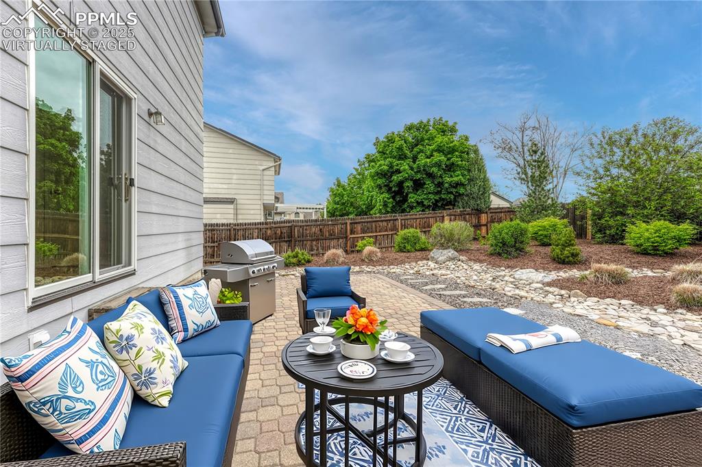 Image 5 of 50: "Virtually Staged" PAVER PATIO