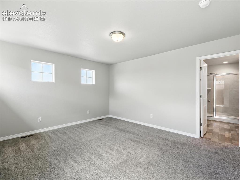 Image 14 of 39: Master Bedroom