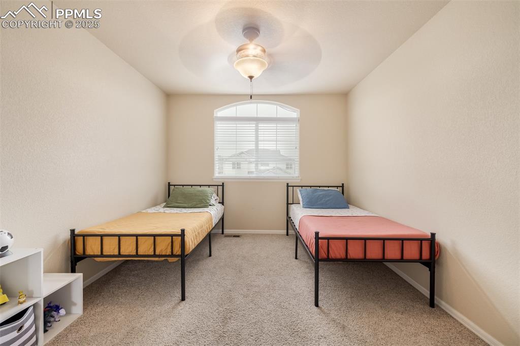 Image 17 of 35: Secondary bedroom with walk in closet