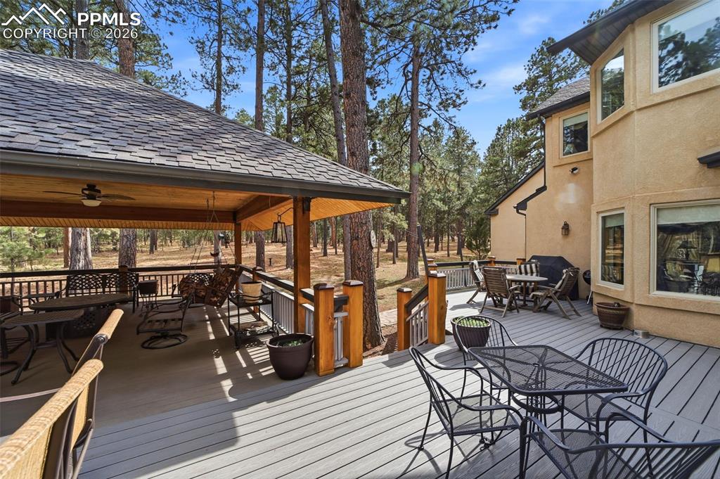 Image 12 of 50: Both covered and uncovered decks