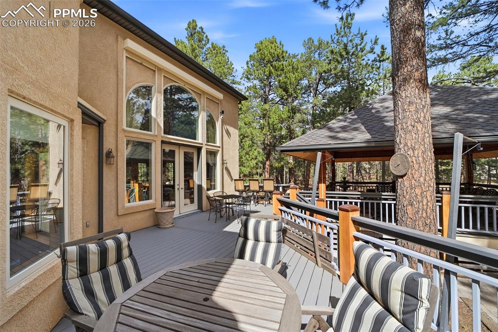 Image 8 of 50: Expansive Outdoor deck outdoor one of two outdoor decks
