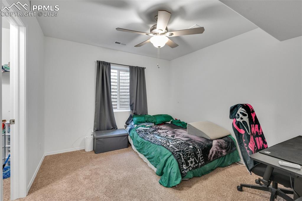 Image 30 of 40: Basement Bedroom