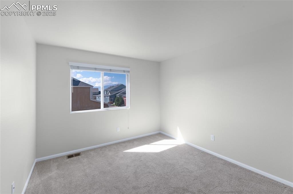 Image 20 of 29: Bedroom