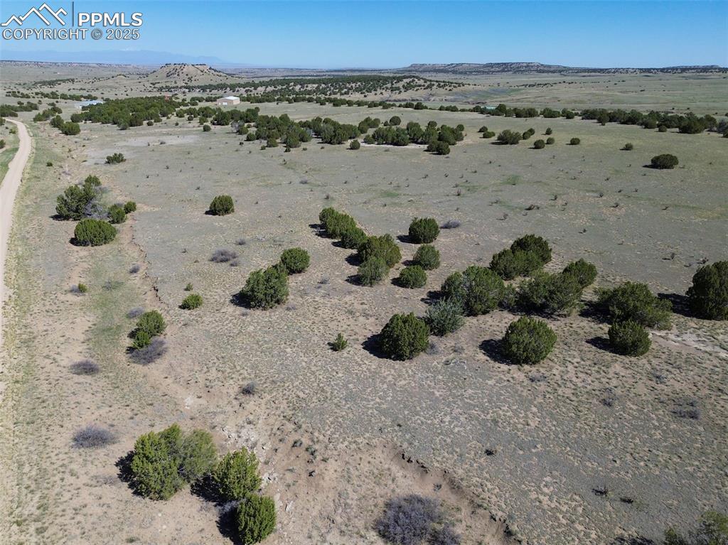 Image 22 of 23: Drone / aerial view with a rural view, a desert view, and a mountain view