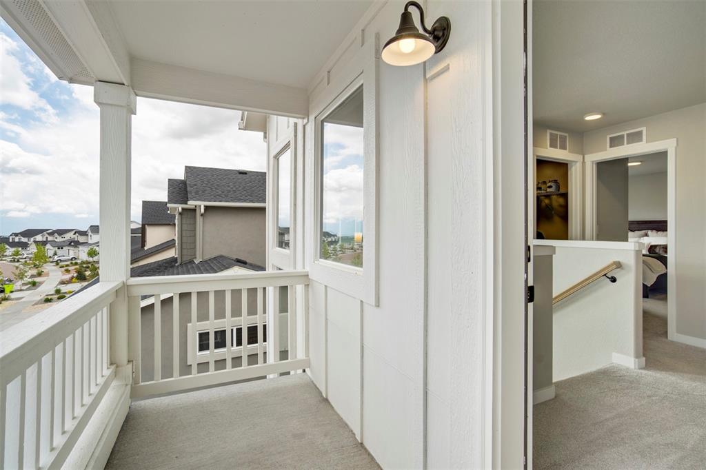 Image 21 of 43: Balcony with a residential view