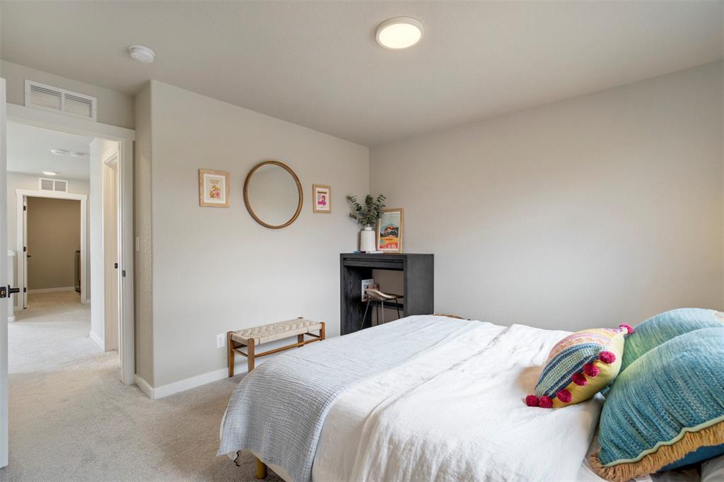 Image 28 of 43: Bedroom with baseboards and carpet