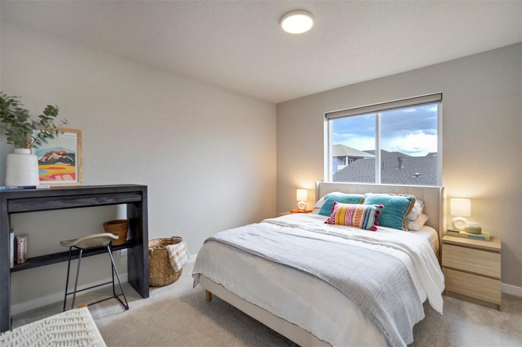 Image 29 of 43: Carpeted bedroom featuring baseboards