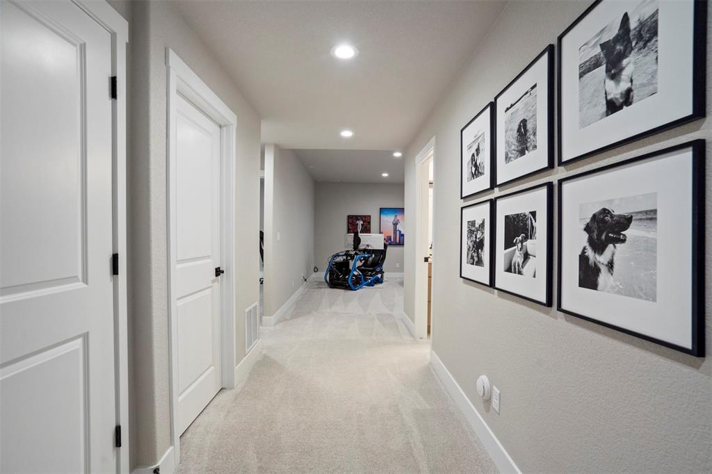 Image 33 of 43: Corridor featuring recessed lighting and light colored carpet